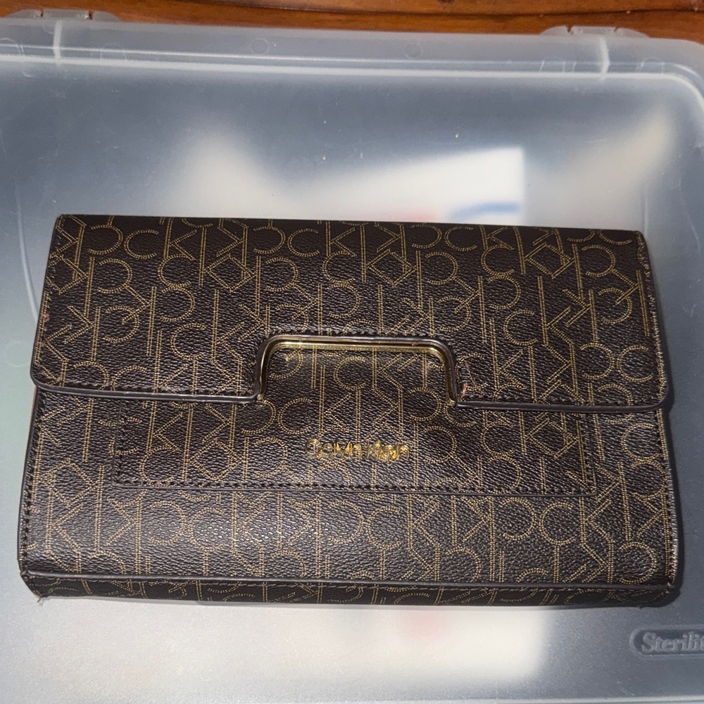 Calvin Klein Black and Gold Monogram Clutch